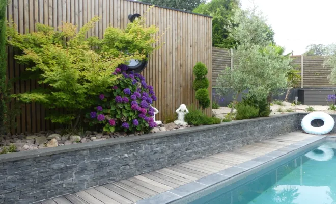 Rénovation d'une terrasse autour d'une piscine à Monfort-sur-Meu